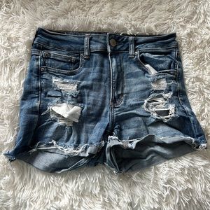 american eagle next level stretch blue distressed shorts!